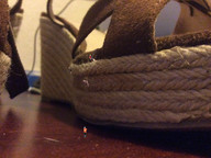 micro high_heels climbing walking shrunken_people close_up point_of_view