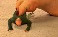 collage clothed barefoot crawling shrunken_man nails painted under_foot jacket on_knees balding