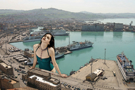 giantess collage city long_hair swimsuit ocean brunette cruise_ship open_mouth vehicles closed_eyes necklace ships