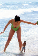 bikini gentle collage black_hair cleavage ocean asian shorts bending_over running shrunken_man looking_down goingdown