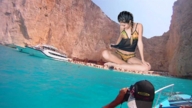 giantess collage panties long_hair beach ocean sitting lingerie camisole looking_down boats braid photographer crowds legs_crossed yacht