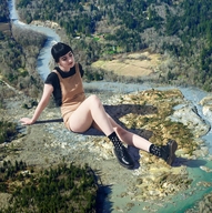 giantess collage black_hair clothed sitting outdoors