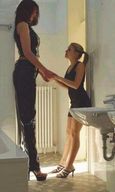 blonde clothed high_heels brunette ponytail amazon lesbians bathroom holding_hands mini_skirt leather_clothing