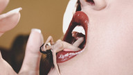breasts nipples nude vore black_hair tongue saliva lying_down shrunken_woman close_up nose lipstick fingernails imminent_vore digital_render