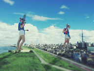 giantess collage city barefoot brunette asian shorts walking looking_down giantesses outdoors airraid