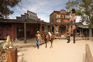 giantess collage city jeans topless horse boots walking standing outdoors cowboy_hat