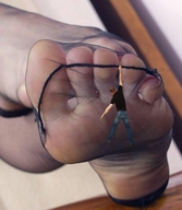 collage feet toes soles shrunken_man dangle hanging_on nyloned_feet marklovefeet