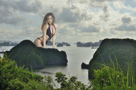 breasts giantess collage mega swimsuit water island wonderslug clouds sky looking_at_viewer hannah_davis halong_bay