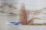bikini collage blonde beach wet shrinking smiling sitting medium_length_hair shrunken_woman photograph wet_hair