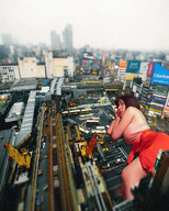 giantess collage city sleeping large_breasts clothed brunette asian lying_down vehicles outdoors airraid kyojingirls