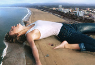 giantess collage city mega blonde clothed beach barefoot ocean buildings wet jeans lying_down top docop taylor_swift