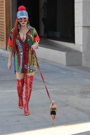 collage blonde long_hair clothed cleavage high_heels domination red_hair shorts walking shrunken_woman sunglasses leash tattoo top looking_at_viewer high_heel_boots