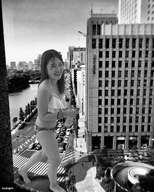 bikini gentle giantess collage city monochrome black_hair long_hair barefoot buildings smiling asian drink walking kyojingirls