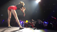 gentle collage clothed shoes singing legs amazon shorts bending_over onlookers shirt crowds taylor_swift concert
