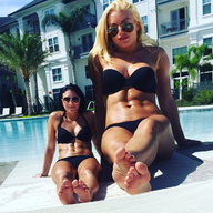 bikini gentle collage blonde black_hair long_hair barefoot cleavage sitting navel muscles amazon pool sunglasses size_comparison sunbathing hotel
