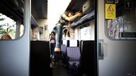 long_hair clothed brunette train amazon standing size_comparison digital_render fater luggage bare_midriff