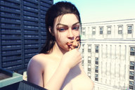 collage nude vore city large_breasts handheld buildings outdoors looking_at_viewer looking_at_tiny digital_render madamemaeve