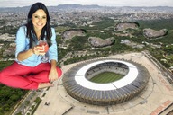giantess collage black_hair barefoot stadium drink looking_at_viewer legs_crossed zebos2003 foot_prints