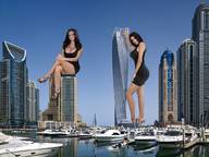 drawing giantess collage city mega black_hair cleavage high_heels giantesses looking_at_viewer legs_crossed sitting_on_building