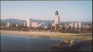giantess city long_hair beach water brunette dress animation walking outdoors lana_del_rey