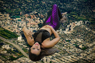 destruction smiling wonderslug tights aerial kerri lying_on_buildings