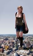 giantess collage city long_hair destruction clothed cleavage buildings brunette celebrity walking looking_down outdoors emma_watson nebuloch