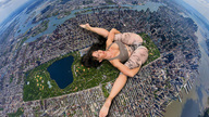 giantess collage giga city large_breasts long_hair cleavage buildings brunette lying_down airplane outdoors new_york_city legs_spread bare_midriff