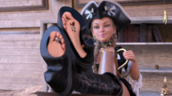 feet blonde long_hair clothed toes high_heels soles insole smiling in_shoe boots shrunken_men sitting trapped indoors jewelry braid see_through pirate digital_render crushguy05