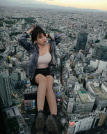 giantess collage city black_hair large_breasts long_hair clothed sitting outdoors kyoujingirls