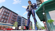 breasts giantess wings city mega color large_breasts armor blue_eyes buildings brunette low_angle gloves street green_hair boots muscles vehicles clouds outdoors sky costume leotard helmet green_skin looking_at_tiny digital_render she-hulk bare_legs marvel_comics hope_van_dyne the_wasp cafe criminals celton