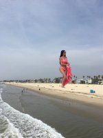 bikini breasts giantess collage mega black_hair long_hair beach barefoot cleavage water buildings unknown_artist sunglasses thighs palm_trees kim_kardashian source_needed