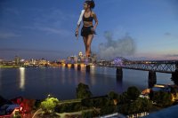 breasts giantess collage city mega black_hair bridge destruction water buildings ponytail phone shorts river selena_gomez sports_bra water_bottle earphone bare_midriff
