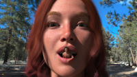 shrunken_man mouth_play digital_render taintedwizard long_hair red_hair forest freckles looking_at_viewer