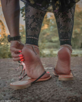 feet toes barefoot fishnets shrunken_man close_up dangle chain bdsm jewelry nail_polish bracelet lower_body digital_render 1girl fishnet_legwear photorealistic giantess