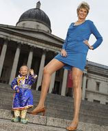 blonde high_heels dress short_hair amazon tallest_woman smallest_man