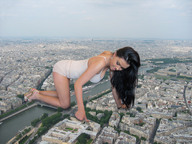 collage city mega black_hair long_hair cleavage high_heels buildings unknown_artist crawling looking_down kristina aerial_view rooftop giantess_kristina thumb_crush