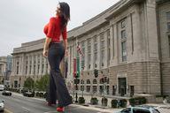 giantess collage city black_hair long_hair high_heels huge_breasts smiling celebrity unknown_artist walking streets denise_milani denise milani