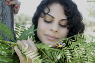 giantess black_hair finger shrunken_men hand face nails garden nature curly_hair rings