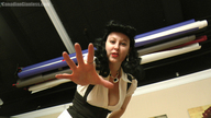 giantess black_hair clothed cleavage shrunken_men hand lipstick photograph point_of_view