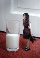 collage black_hair bear milk dress glass shrunken_woman carpet