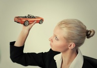 collage blonde handheld shrunken_men captured business_woman shrunken_car holding_vehicle