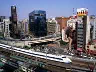 gentle giantess high_heels brunette train window skyscraper