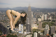 giantess city mega swimsuit destruction high_heels brunette petronas_towers wonderslug bending_down jaime_koeppe kuala_lumpur
