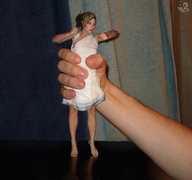 collage handheld scared hand shrunken_woman captured swattr