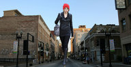 giantess collage city clothed walking people streets knee_high_boots docop taylor_swift wooly_hat
