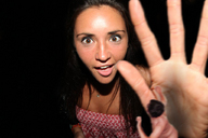 collage brunette smiling shrunken_men hand grabbing