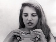 giantess collage monochrome handheld shrunken_man entrapment captured vehicles edison holding_vehicle