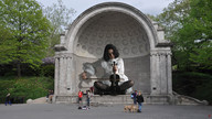giantess collage brunette park boots bow white_blouse pedestrians dome violin black_nylons