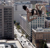 giantess collage feet city cleavage buildings lying_down hand legs jr tattoo looking_at_viewer on_roof