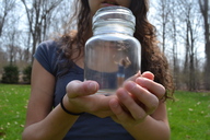 collage finger scared hand shrunken_woman entrapment captured jar outdoors